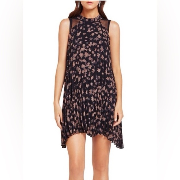 BCBGeneration Dresses & Skirts - BCBGeneration Flowy Halter style Pleated Black Dress with Blush Star Motif